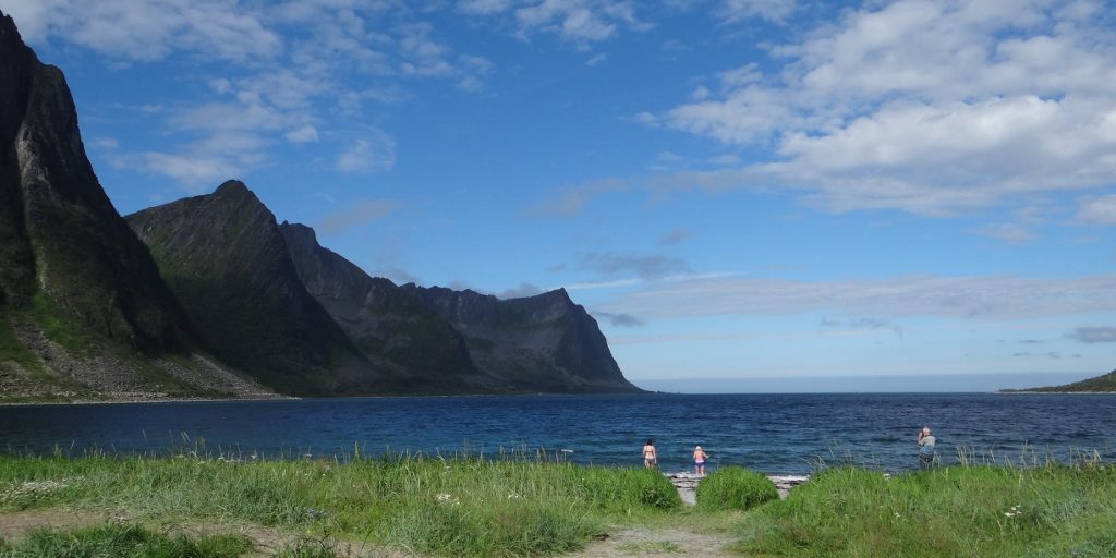 Wayhey! Ju and Angie taking a dip in the Arctic Ocean!