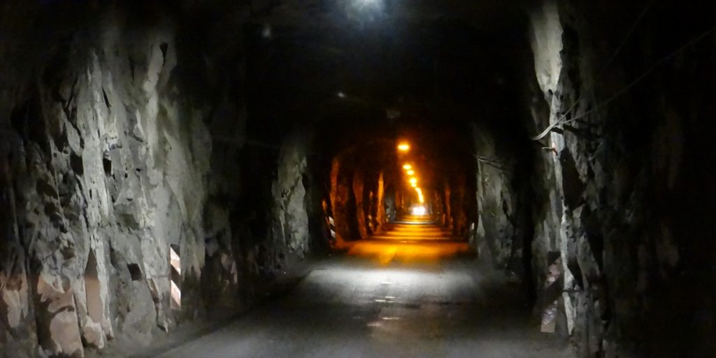 Not what you want to see in a mile-long tunnel wide enough for a single car: someone coming the other way...