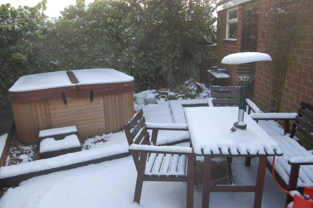 Our old hot tub - steaming away in the back garden
