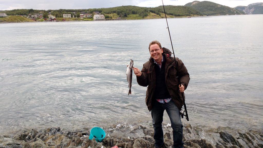 Pulling in a pollock at the Saltstraumen
