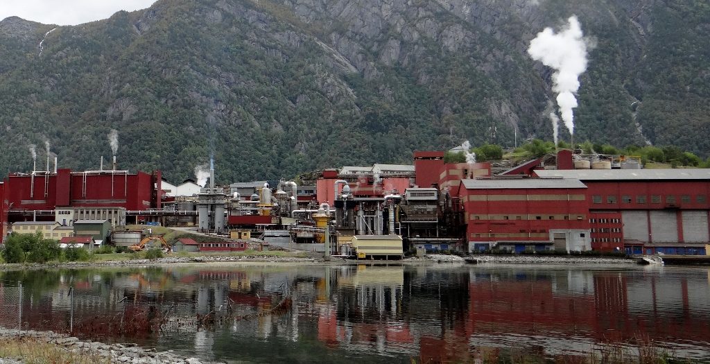 Odda has a large plant which smelts iron ore, looking plain weird in the majestic landscape of a fjord