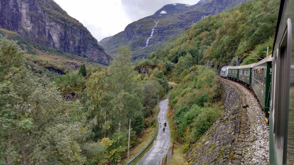 The workers road alongside the train