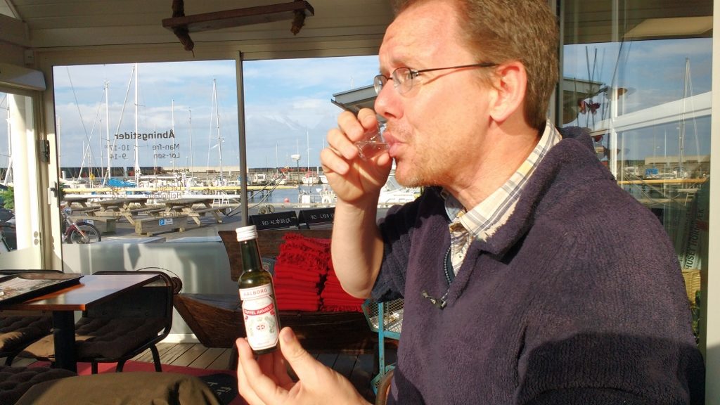 Akvavit, which Ju later remembered you're supposed to chase with beer. Presumably so you don't taste how evil it is?