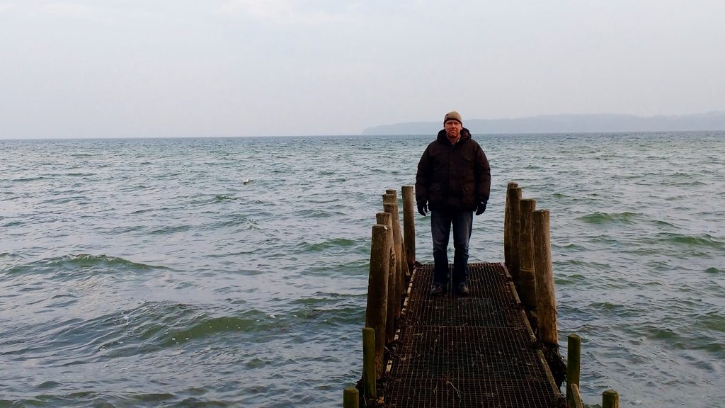 Unhappy Jay by the sea - bad weather and wonky sleeping spot don't help