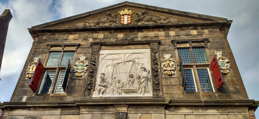A relief in the Cheese museum shows a tableau of traders weighing cheese - so of course we bought our cheese here