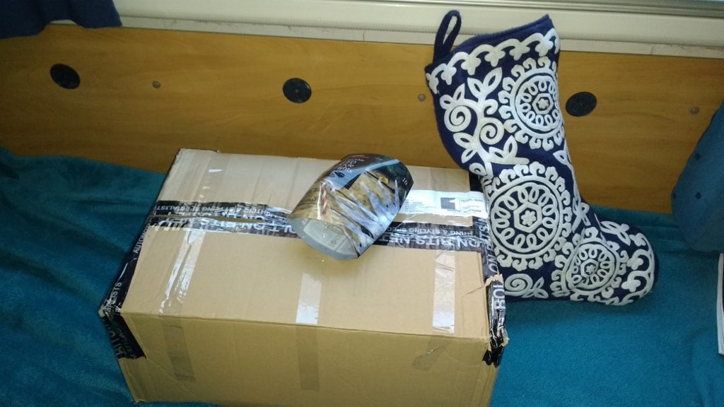Christmas in a Box. And a Sock. Packed up ready for celebrating somewhere on the Med
