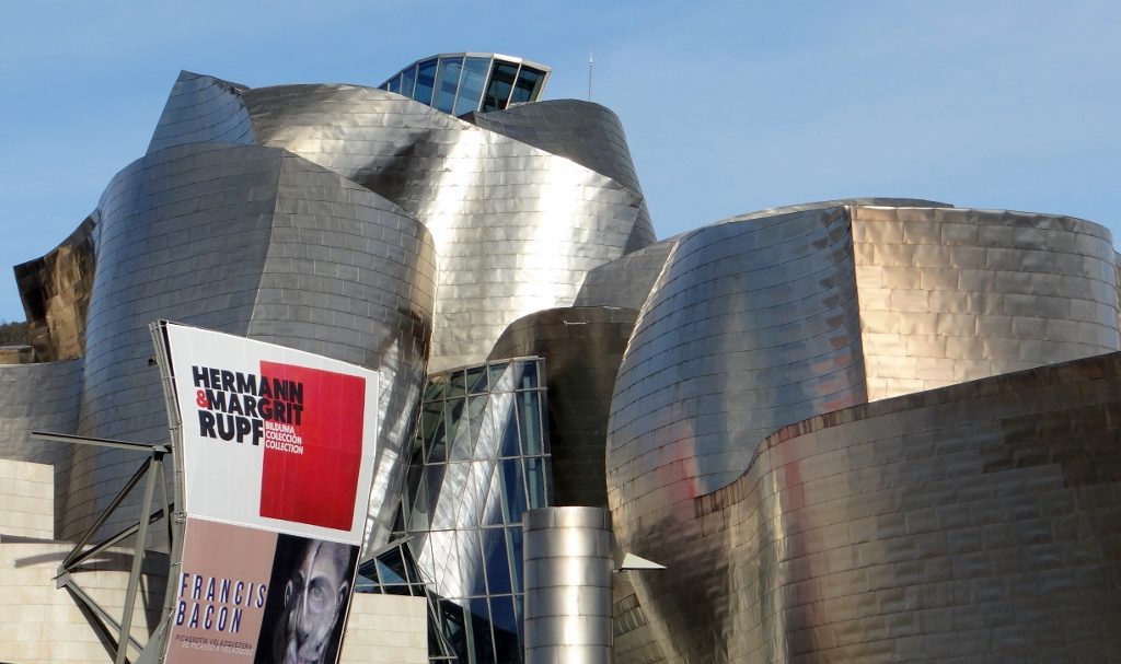 The Guggenheim, somehow silver and awash with colours at the same time