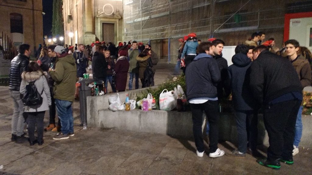 No bottles allowed in the main square so everyone 'got loose' around the town instead. A small number of police wander about on foot, and we saw no trouble.