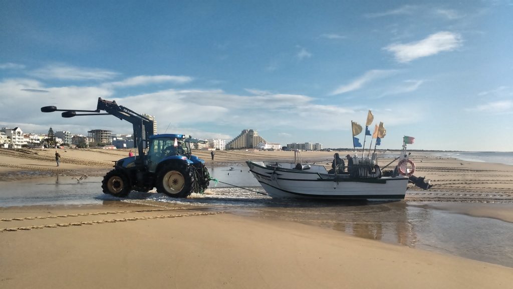 The boats are flat at the back, keeping them upright on the sand