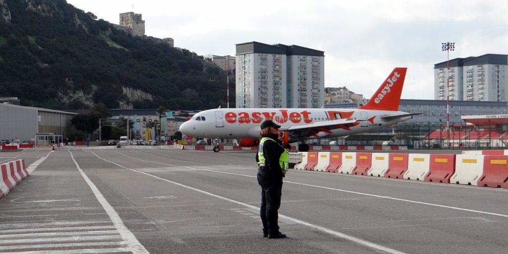 The main road into Gibraltar is also a runway, built on reclaimed land just inside the UK border
