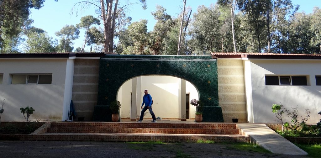 Diamant Vert ablution block, complete with Big Foot Phil stalking into the mens