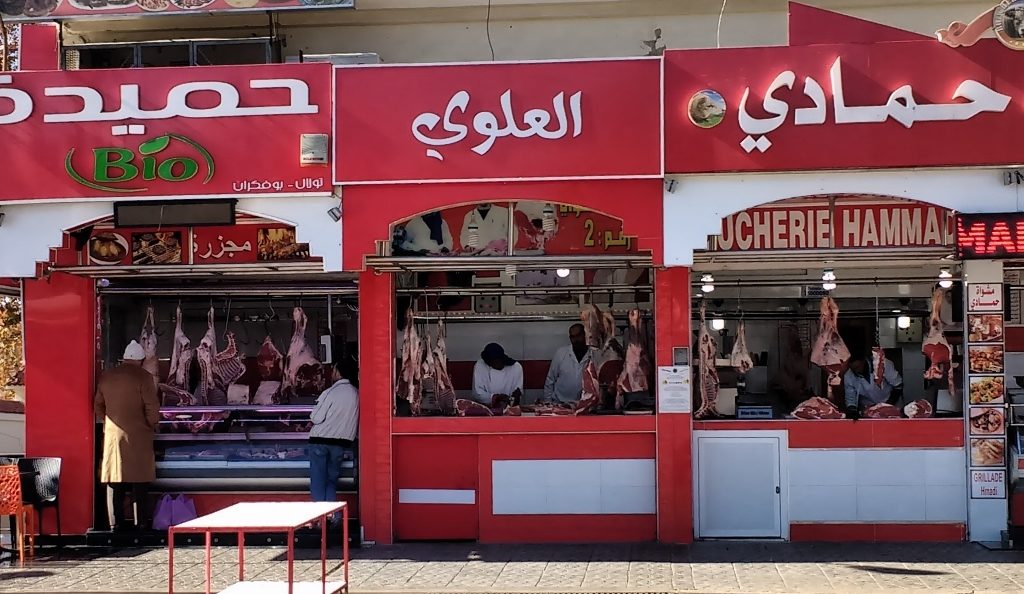 Butchers in Morocco. Traders here tend to group shops selling similar goods together