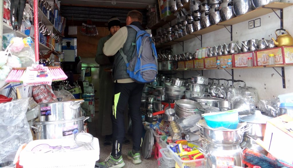 Phil checking out a metal ware shop