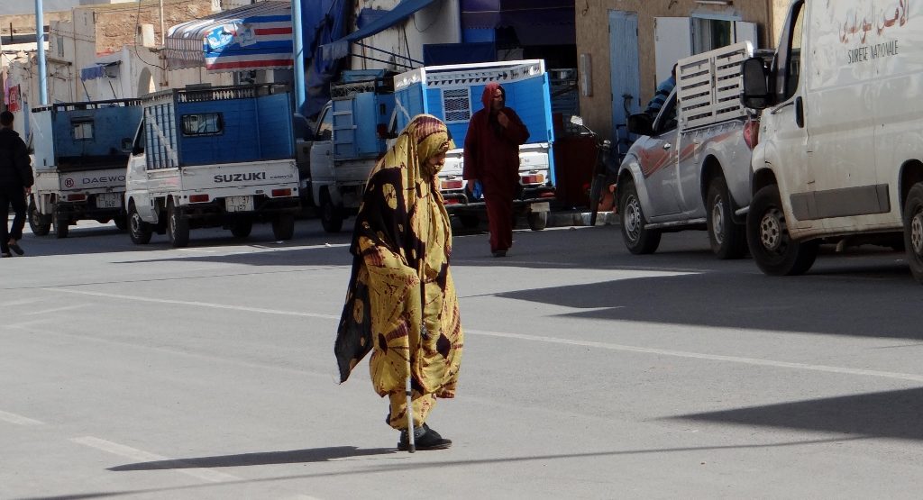 A lady crossing the road in Sidi Ifni. Women here in Morocco seem to manage a trick of being colourfully clad and invisible at the same time