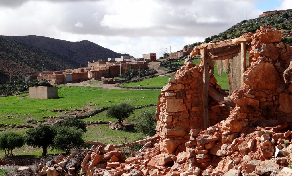 A tumbling gateway in the town at the top of the valley, where the road turns into a track