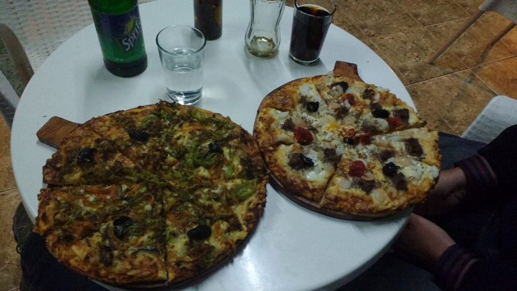 They took a while to come, and we wondered if they'd resemble the Italian style of pizza while we waited, but when they arrived we were happy bunnies!