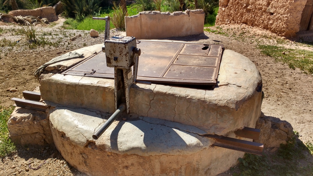 A hand-pumped well in the oasis about a mile from here