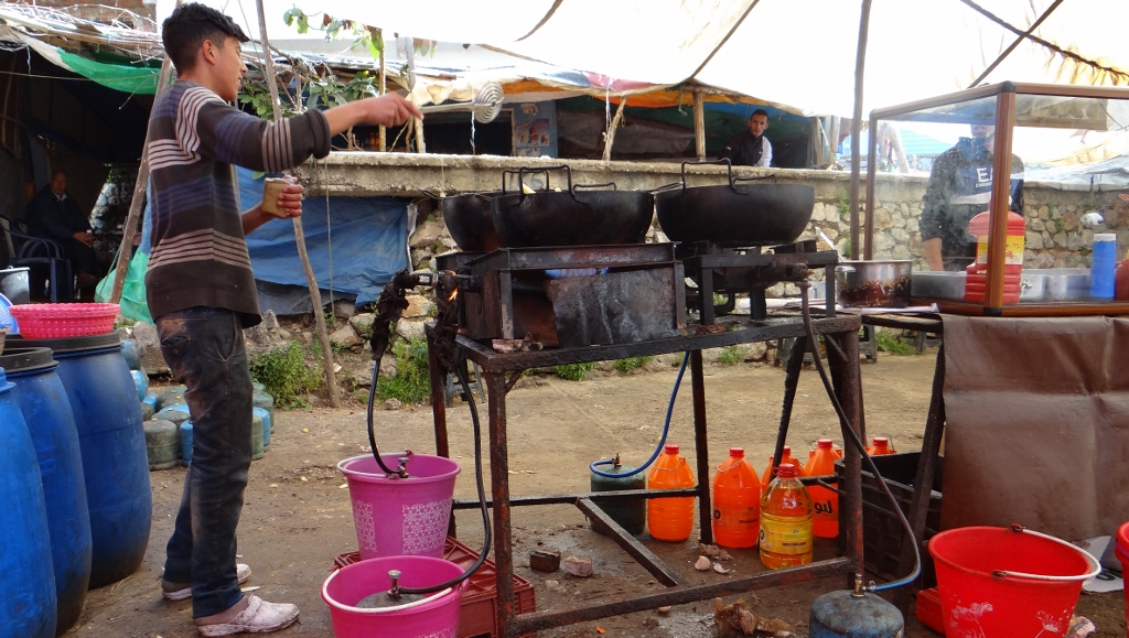 They had the gas bottles in buckets of hot water, which we're guessing was to increase the pressure as the flames roared like a rocket