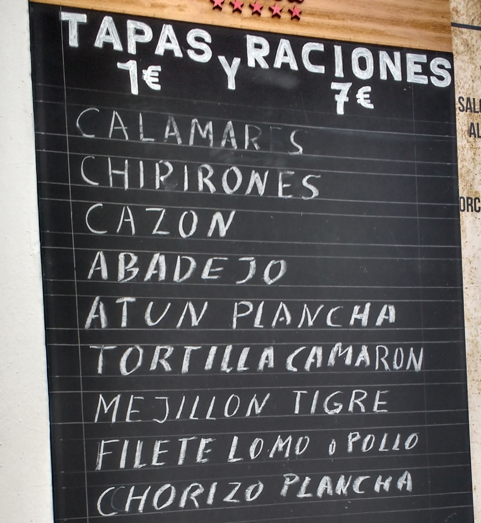 We keep forgetting to photo the food, and only remember when we've half eaten it, so here's a photo of the menu instead...