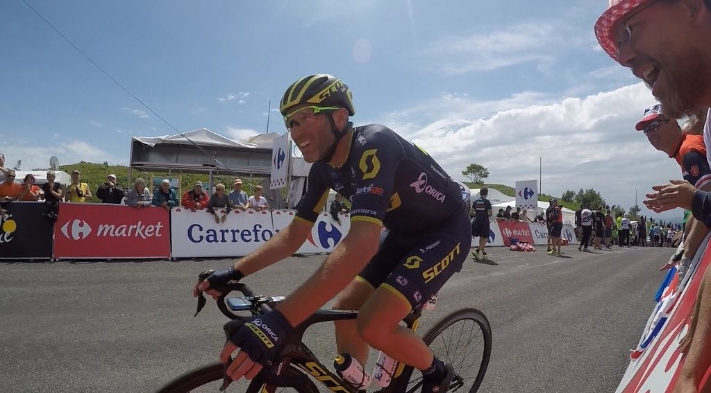 Just what you need at the top of a climb like this - a portly British bloke shouting at you to go, go, go!