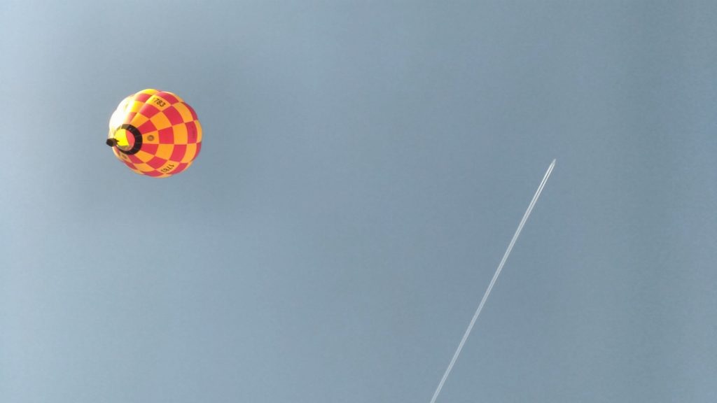 I love this shot. 166 years after the Montgolfier flight, the first commercial airliner flew.