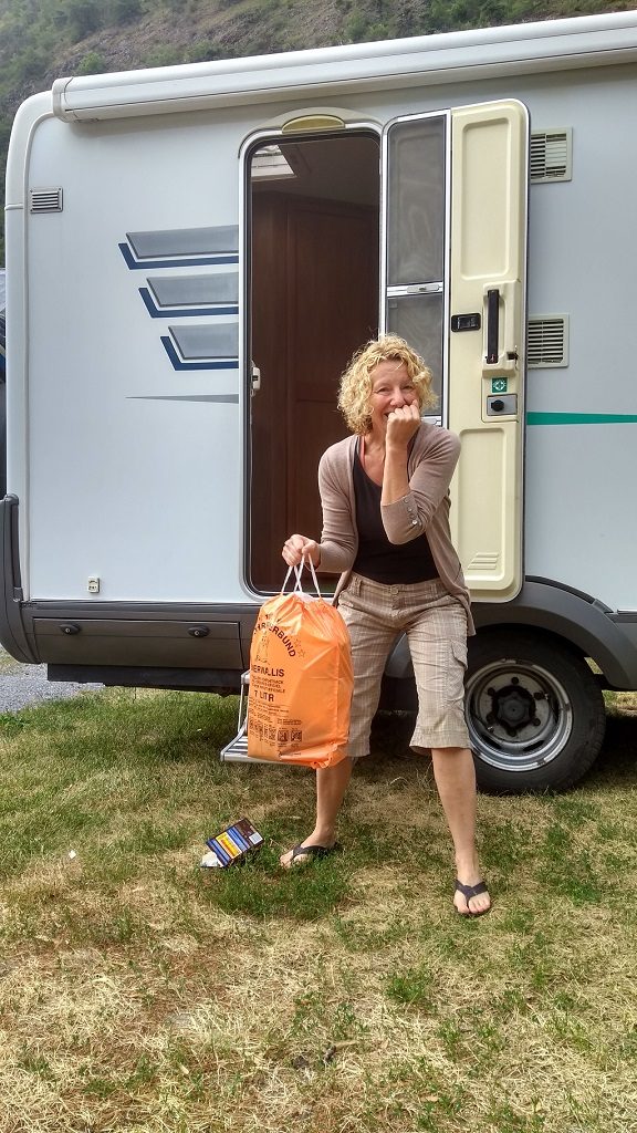 Jules running the Switzerland Orange Rubbish Bag Gauntlet