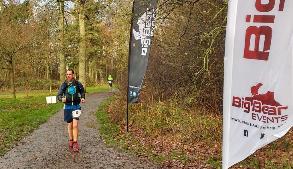 At the end of each lap you ran back to the aid station, had your number recorded, then turned around for the next lap