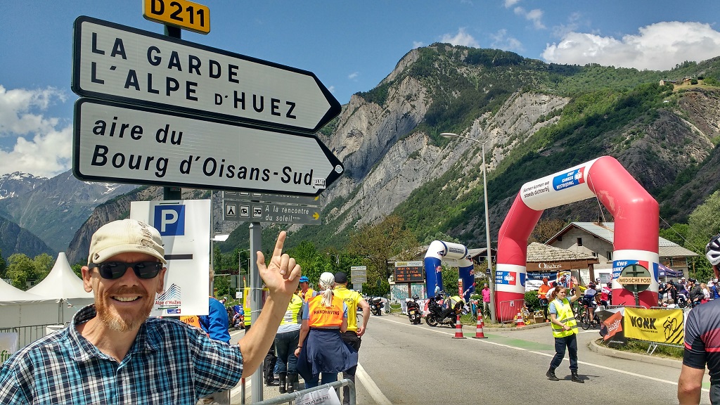 The start of the climb to Alpe d'Huez , with the lower Alpe d'HuZes village (there was another one built at the top in the ski station itself)