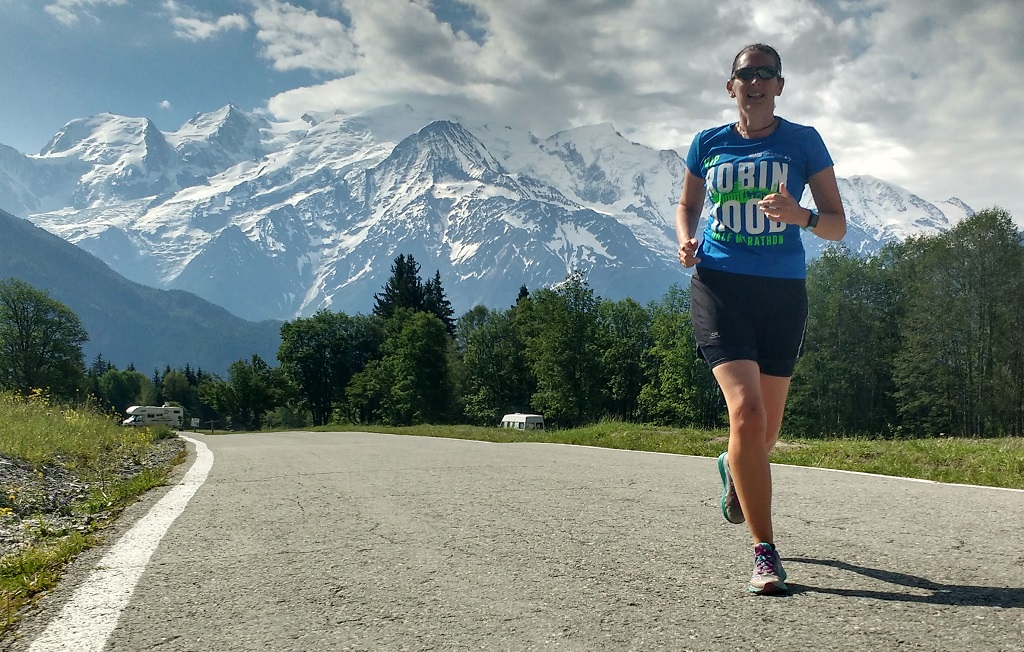 Ju running in front of the Mont Blanc Massive