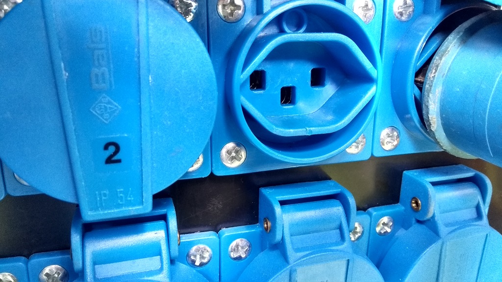 The Swiss three-pin plug on a campsite in switzerland