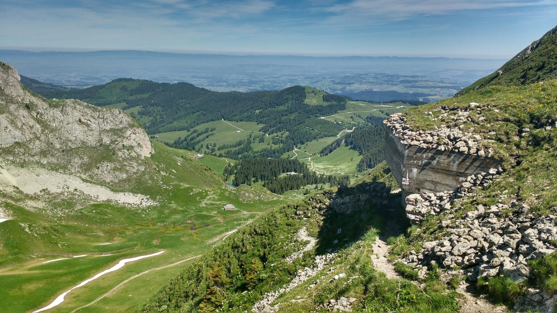 A gun bunker looking down over Swiss pre-alpine meadows