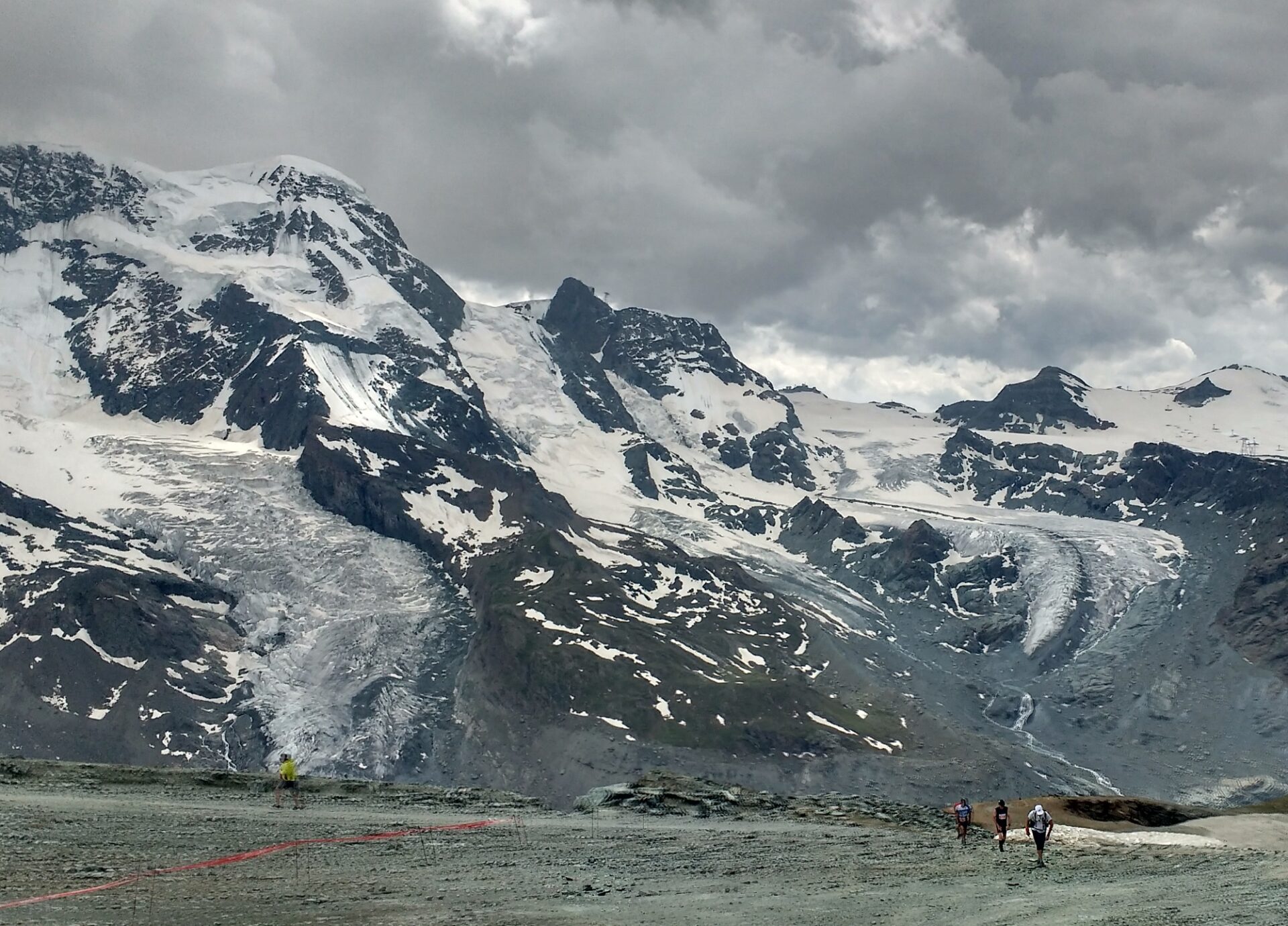 Runners on the final ascent to Gornergrat, the last few meters of a 28 mile ultramarathon