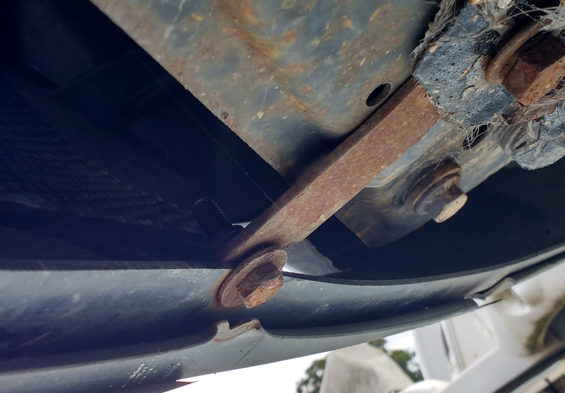 Bolt holding Hymer B544 motorhome bumper in place