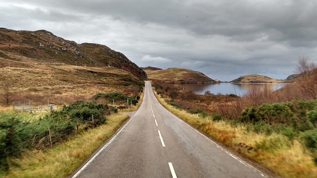 Beautiful colours as we pass a small loch on our way south