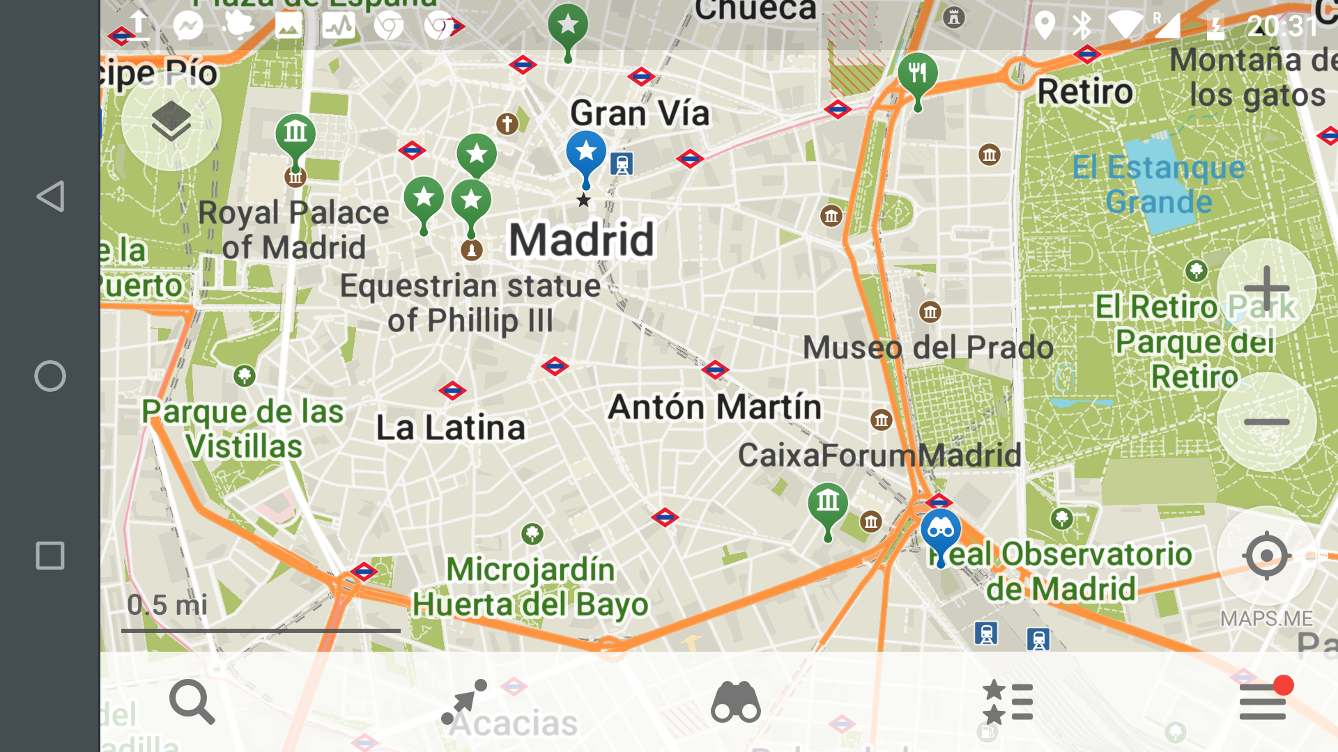Madrid train stations on maps.me: the blue pin to the bottom-right is Puerta de Atocha. The blue pin to the upper-left is Puerta de Sol. 