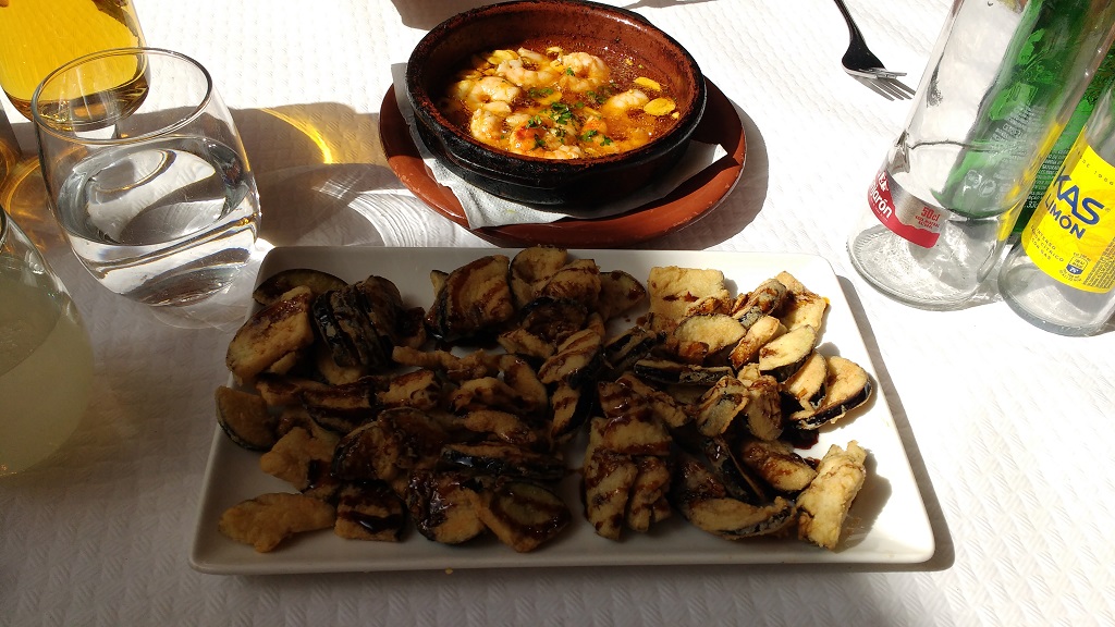 Fried food all the way! Deep-fried aubergine with cane honey and gambas pil-pil (prawns with garlic, which arrive in a pool of bubbling hot oil)