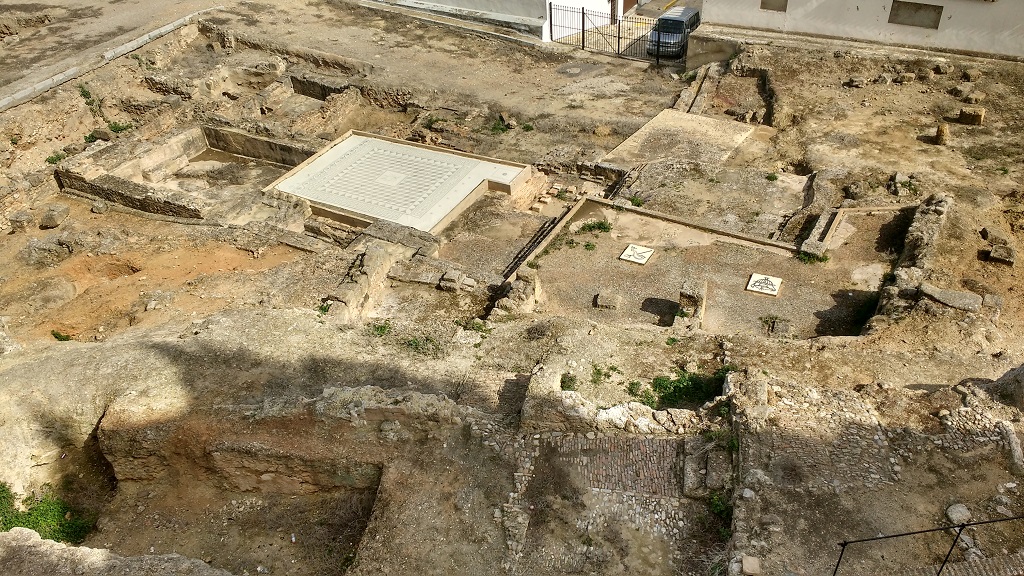 Antequera's Roman Baths. The mosaics on view are a tarpaulin, it's not clear exactly what remains beneath it.
