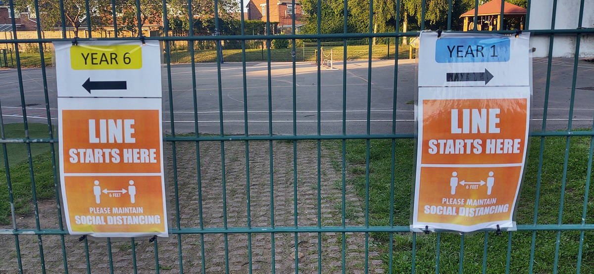 social distance signs outside school during lockdown