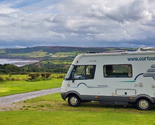 Motorhome at campsite overlooking Robin Hoods Bay