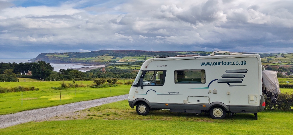Motorhome at campsite overlooking Robin Hoods Bay