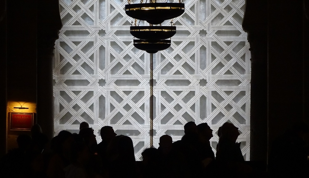 People Silhouetted before an Islamic Pattern Mezquita, the Mosque–Cathedral of Córdoba