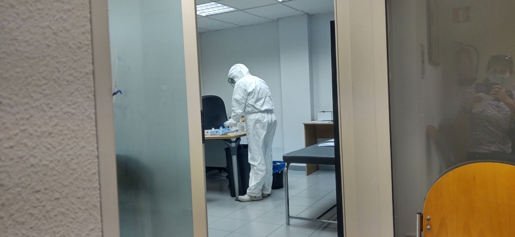 The clinician doing the COVID-19 testing in full PPE in Santander