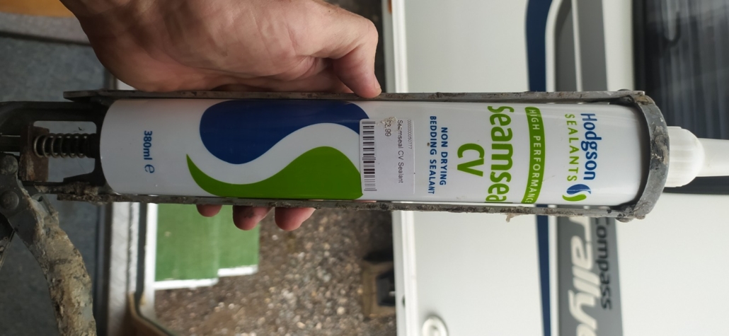 A tube of Seamseal CV non-setting mastic for resealing motorhome and caravan skylights in an applicator gun