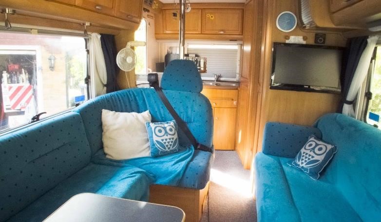 Inside the comfortable living area of a modern motorhome.