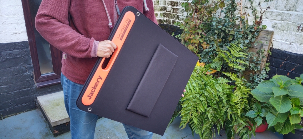 Carrying one of the folded-up SolarSaga panels