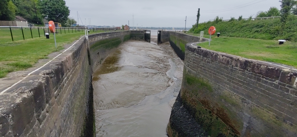 The silted-up outer dock and stuck gates at Lydney Harbour