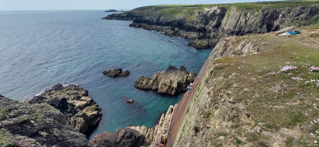 Cliff-climbers seen from the coastal path south of St Davids