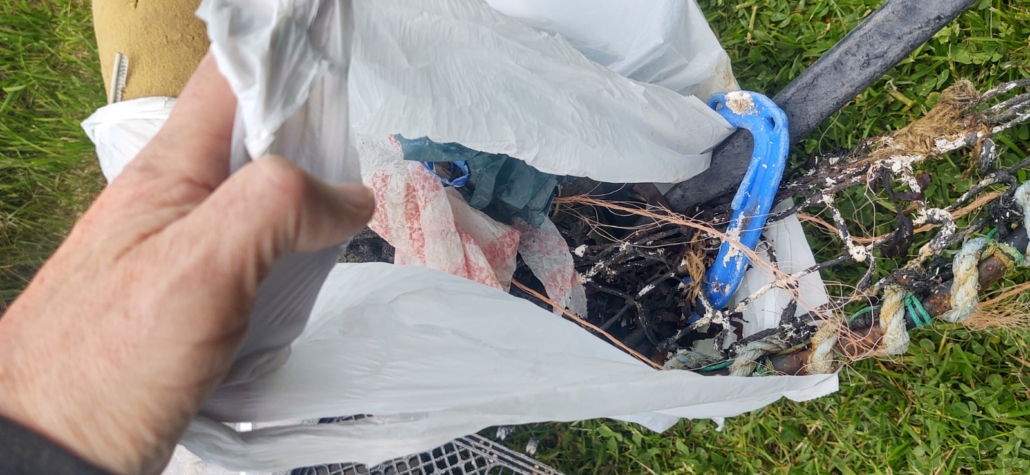 A couple of bags of rubbish I cleaned from the beach opposite us after Geraint left