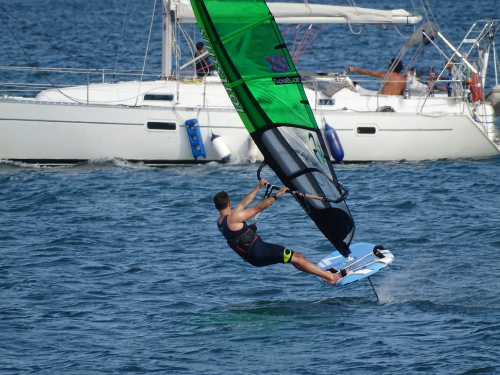 A windfoiler flying across the Iroise Sea at Brest, Brittany