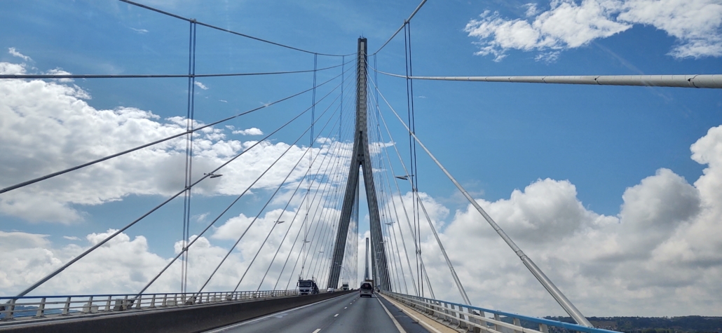 Heading over the majestic Pont du Normandie. Cyclists were pushing their bikes up the narrow path to the right